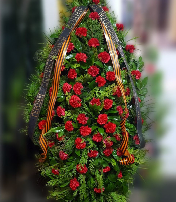 Венок Из красных гвоздик купить с доставкой в Нижнем Новгороде